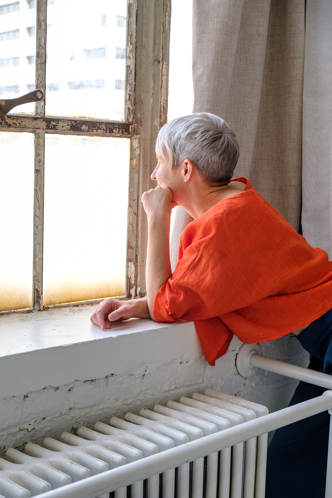 Kristen Peairs looking toward a bright window
